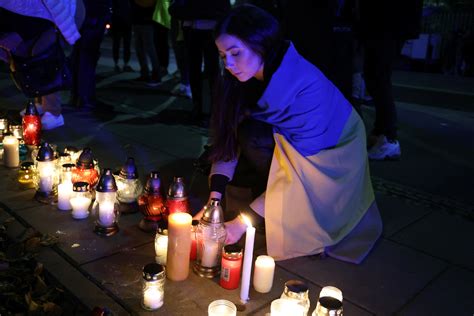 Protestors in Warsaw accuse Russia of terrorism after missile strikes