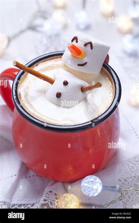 Red Mug With Hot Chocolate With Melted Marshmallow Snowman Stock Photo Alamy