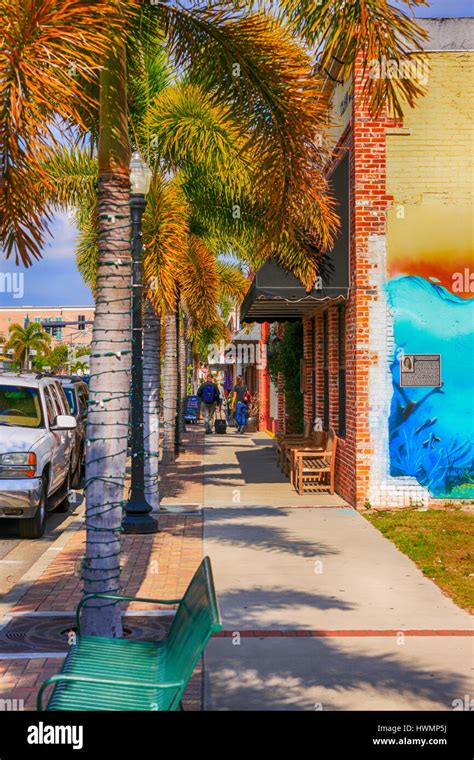 People Walking Along Marion Ave In Downtown Punta Gorda Florida Stock