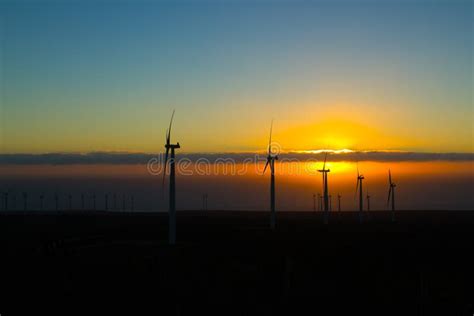 Windmills in sunset stock photo. Image of landscape, field - 39021748