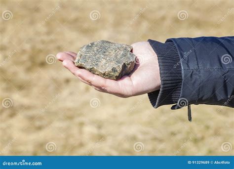 Man Holding Stone Stock Image Image Of Hand Metal Meteor 91329689