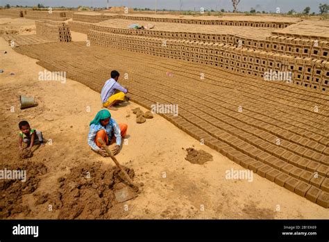 Brick Factory Where Families Are Making Bricks With Clay Before Drying