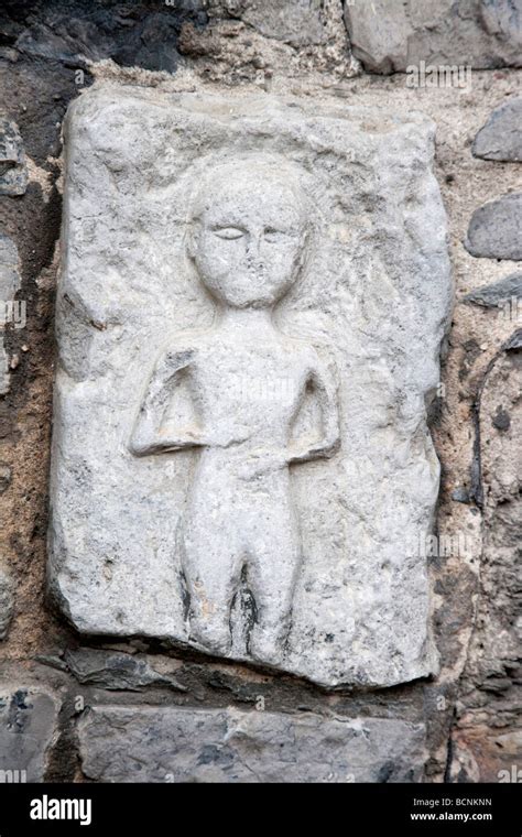 Irish stone carving of medieval Man, Cashel, Ireland Stock Photo - Alamy