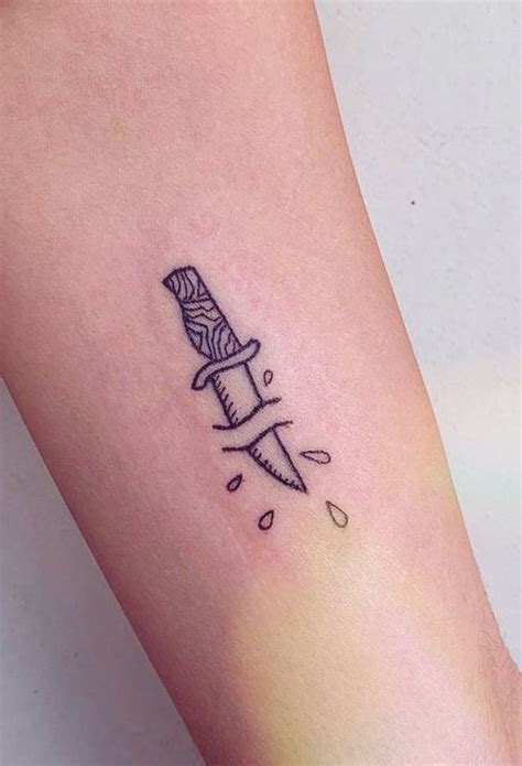 Minimalist Dagger Tattoo