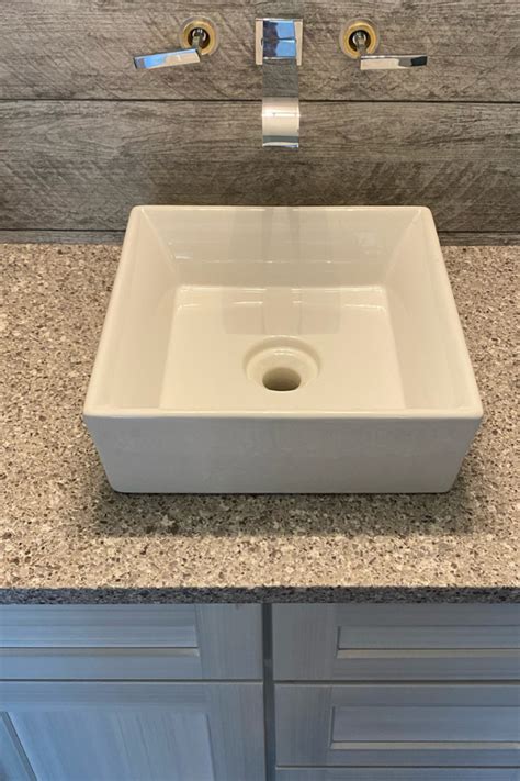 Alpina White Quartz Countertop And Pedestal Sink White Quartz