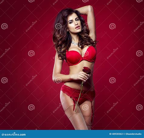Sensual Brunette Woman With Rose Stock Image Image Of Pretty Posing 48930363