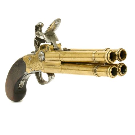 A Fine Brass Framed Flintlock Volley Pistol Capable Of Firing Four