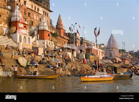 The Hindu Ghats on the banks of the Holy River Ganges (Ganga) in the city of Varanasi (Benares ...