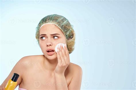 Woman Wipes Face With Lotion Naked Shoulders Skin Care Cosmetology Stock Photo At Vecteezy