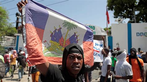 A gang in Haiti opens fire on a crowd of parishioners trying to rid the ...