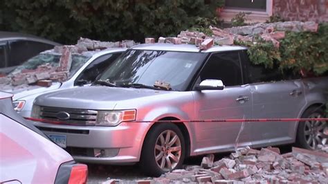 Building Collapse Damages Cars And Sends Firefighter To The Hospital In