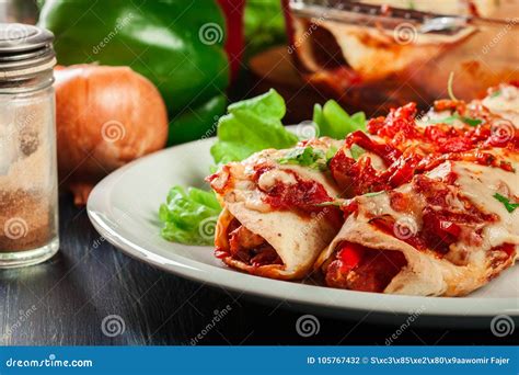 Traditional Mexican Enchiladas With Chicken Meat Spicy Tomato Sauce