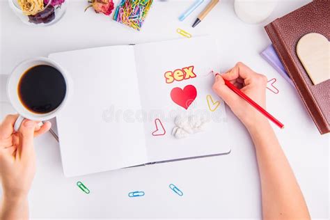 Woman Planing Date And Sex In Her Personal Organizer Hands With Pencil