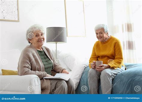 Elderly Women Spending Time In Bedroom Senior People Care Stock Photo