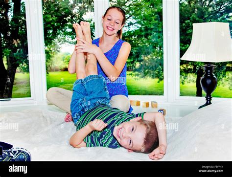 Tickle feet hi-res stock photography and images - Alamy