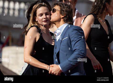 Tom Cruise kisses Rebecca Ferguson during the Red Carpet at the Global ...