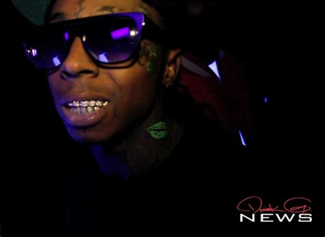 Lil Wayne Shows Off His New Black Light Tattoos