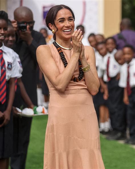 Pictures: All of Meghan Markle's Outfits in Nigeria