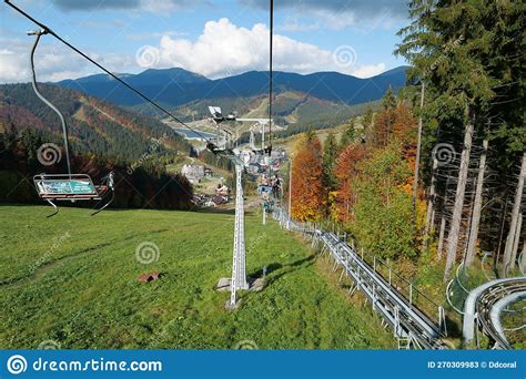 People On Ski Lift In Bukovel Village Largest Ski Resort In