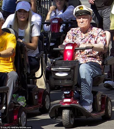 Hugh Hefner In Disneyland On Mobility Scooter And Wife Crystal 27