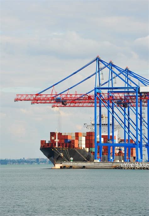 Container Ship Under Port Crane Stock Image - Image of machinery, pier ...