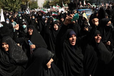 Iranian State Organized Marchers Call For Execution Of Protesters