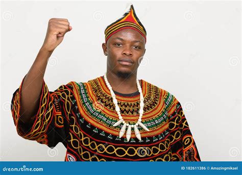 Young Handsome African Man in Traditional Clothing with Fist Raised ...