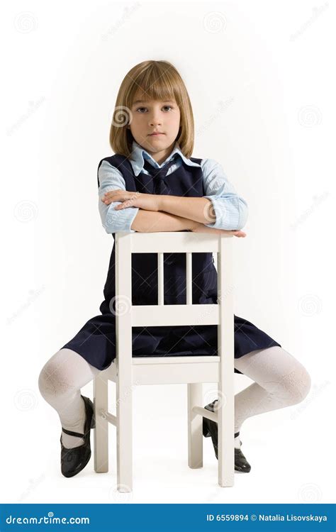 Schoolgirl Sitting On The Chair Stock Images - Image: 6559894