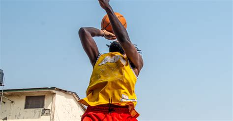 Basketballer dunking on a Midair · Free Stock Photo