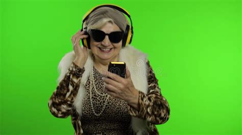 Elderly Caucasian Grandmother Woman Dance Celebrate Listen Music