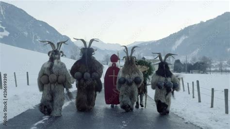 Video Stock A Group Of Traditional Krampus Walks In Gastein Austria