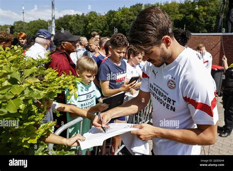 EINDHOVEN Marco Van Ginkel Of PSV Eindhoven Hands Out Autograph