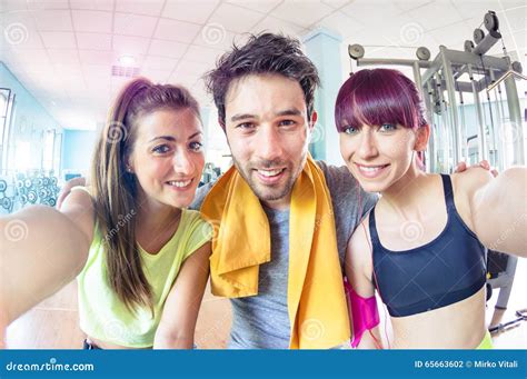 Happy Active Friends Trio Taking Selfie In Gym Training Studio Stock