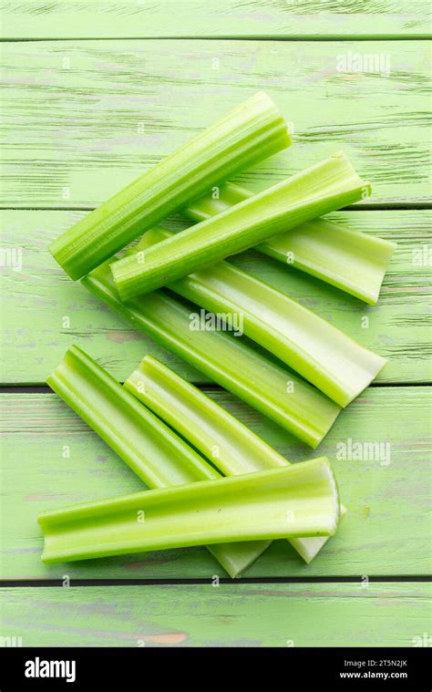 Pile of celery ribs isolated on white background Stock Photo - Alamy