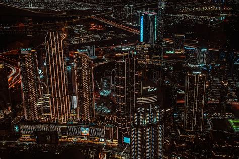 A city at night with lights and buildings · Free Stock Photo