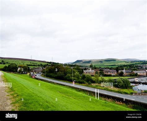 The A628 going into the village of Tintwistle, Derbyshire, England,UK ...