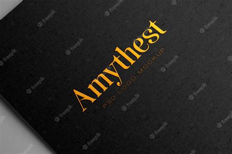 Premium Psd Embossed Golden Logo Mockup On Black Paper