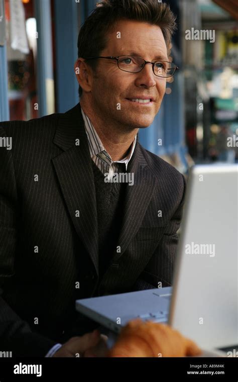 Mature Man With A Laptop Outdoors Stock Photo Alamy