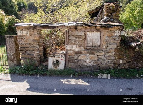 The famous washing machine left in the ruins of a house in the village ...