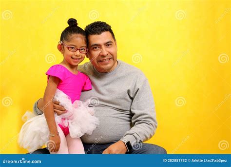 Dad Plays With His Year Old Brunette Latina Daughter Dressed As A Ballerina In A Tutu