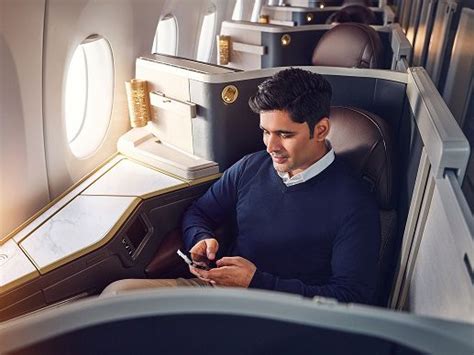 Etihad Airways Business Class With Guest Taking Advantage Of Etihad S