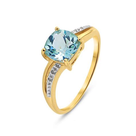 Bague Or Jaune 375 Topaze Bleue Coussin 7x7mm Et Diamant Ref 46291