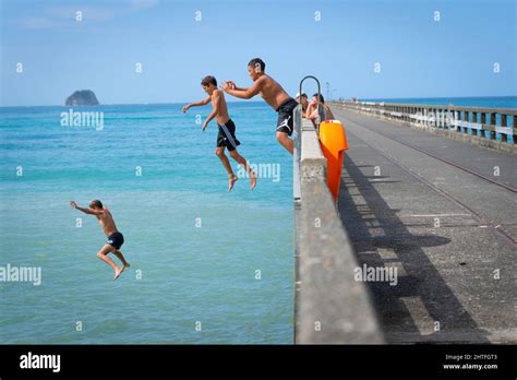 Tolaga Bay New Zealand February 5 2022 Local Boys Jumping Of Tolaga