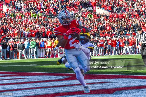 Emeka Egbuka Of The Ohio State Buckeyes Catches A Pass For A News