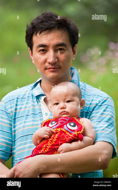 Portrait Of Asian Father And Son Stock Photo Alamy