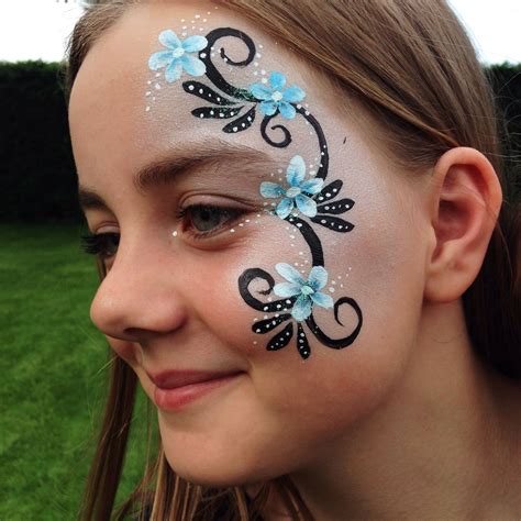 Face Painting Flowers And Swirls Design Face Painting Designs Face Painting Flowers Face