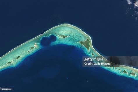 Satellite image of Enewetak Atoll nuclear test craters. News Photo - Getty Images