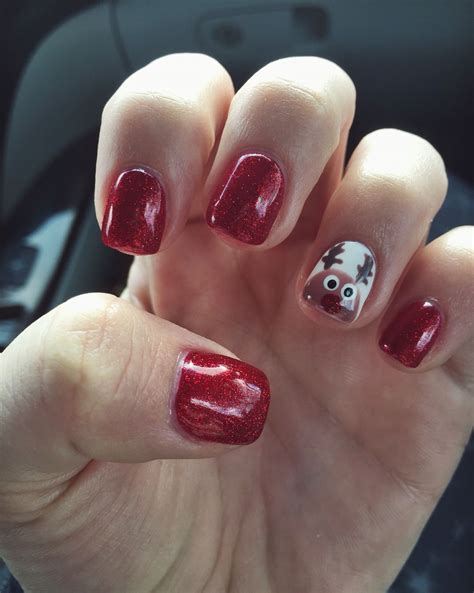 Red Glitter And Rudolph The Red Nose Reindeer Nails Christmas Holiday Gel Acrylic Christmas