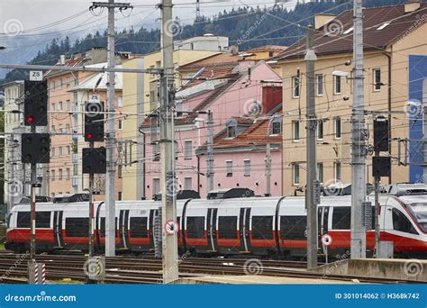 Innsbruck Railway Station And Multicolored Houses Facades Austrian