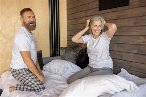 Mature Couple At Home In The Morning Feeling Excited Stock Image Image Of Bedroom Mature